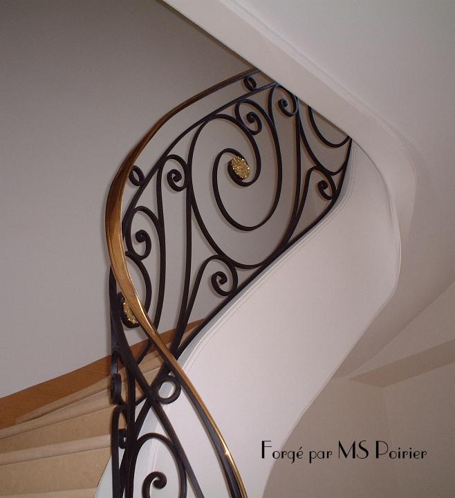 Ferronnerie d'art - rampe débillardée sur limon